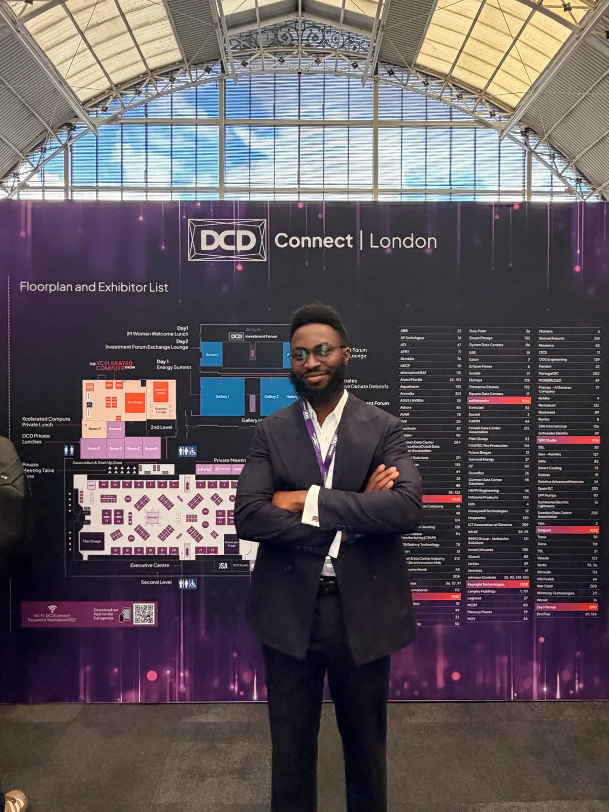 Azor O. Alphonso at the DCD>Connect London floor plan wall